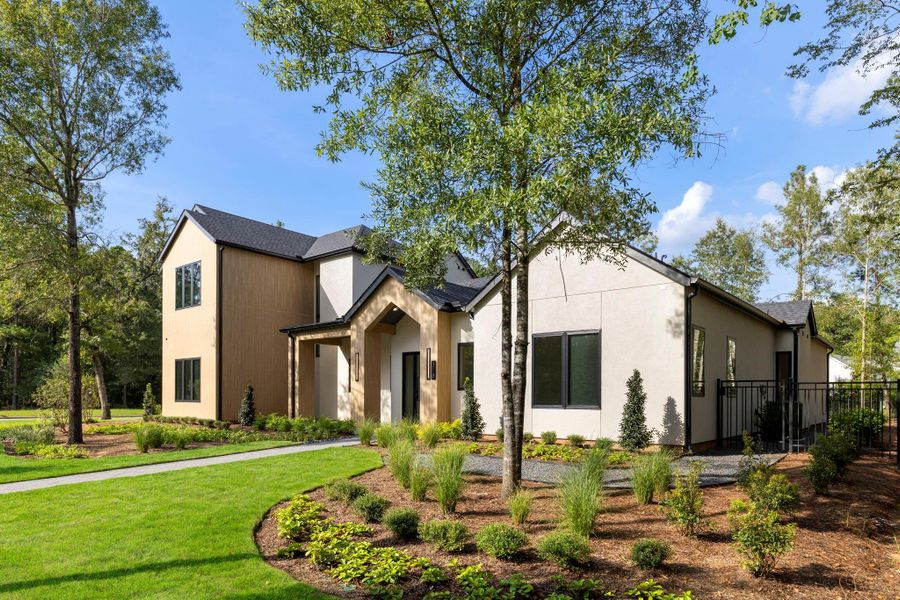 Front exterior of a new home in , Montgomery, TX, highlighting curb appeal (Image 2). Front exterior of a new home in , Montgomery, TX, highlighting curb appeal (Image 2).