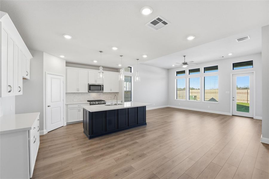 Furnished interior view inside a new home in , Cypress (Image 8).