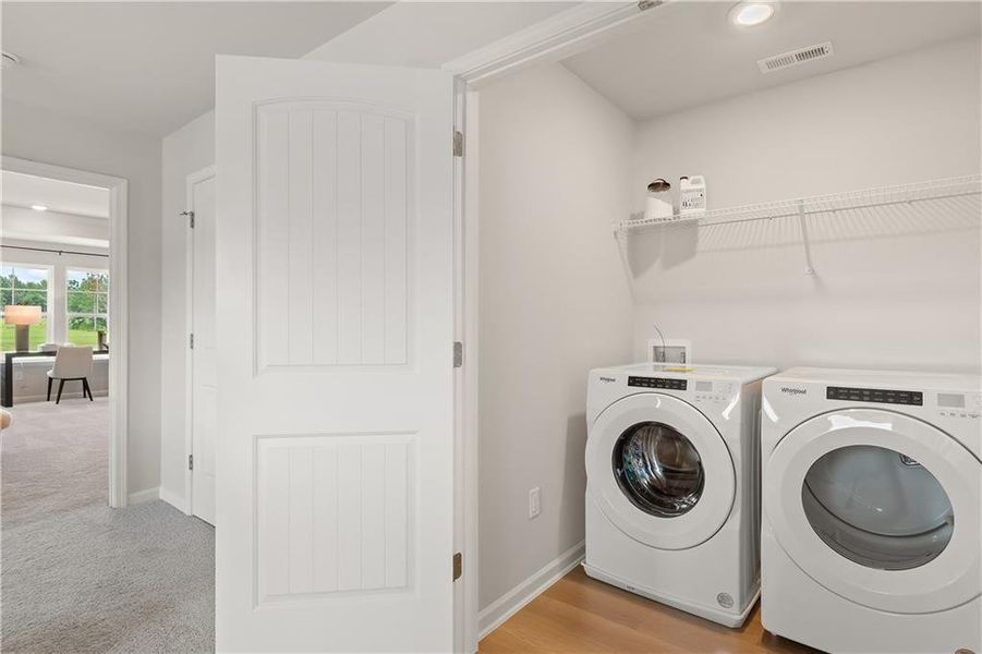Furnished interior view inside a new home in Enclave at Evergreen, Fairburn (Image 28).