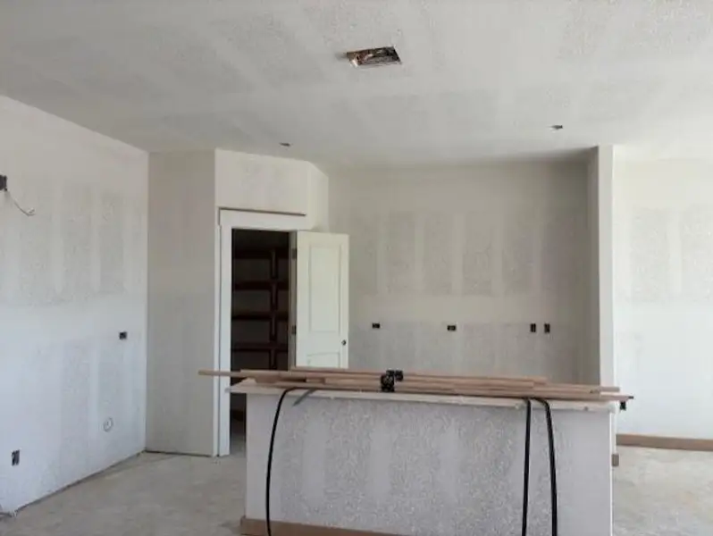 Kitchen featuring a textured ceiling