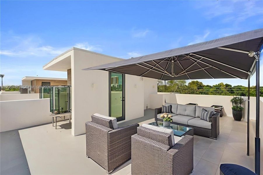 Exterior details and patio area of a home in , Miami (Image 1). Exterior details and patio area of a home in , Miami (Image 1).