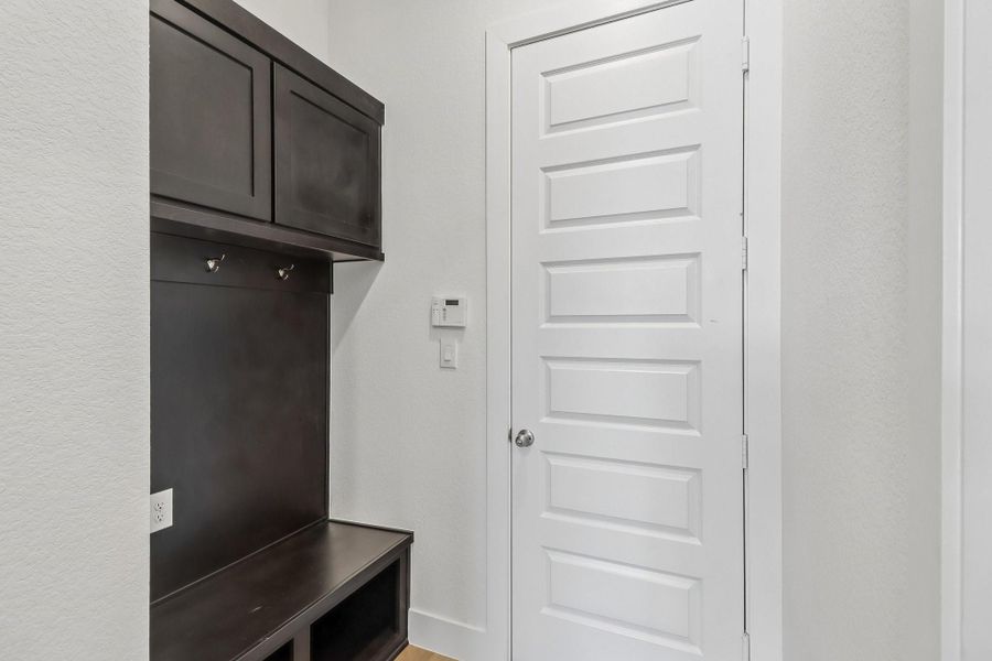 Furnished interior view inside a new home in The Grand Prairie 60', Hockley (Image 17).