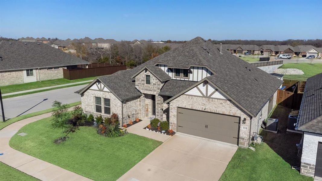 Front exterior of a new home in , Nevada, TX, highlighting curb appeal (Image 1). Front exterior of a new home in , Nevada, TX, highlighting curb appeal (Image 1).