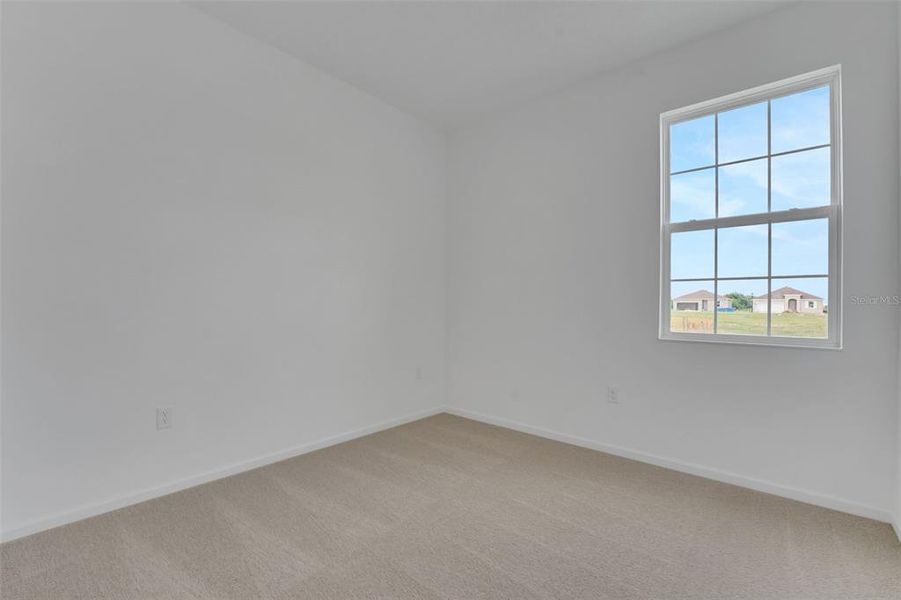 Spacious, unfurnished interior of a new home in Annabelle Estates, Winter Haven (Image 20).