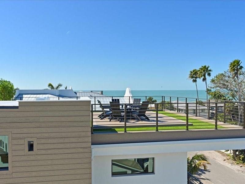 Exterior details and patio area of a home in , Anna Maria (Image 33).