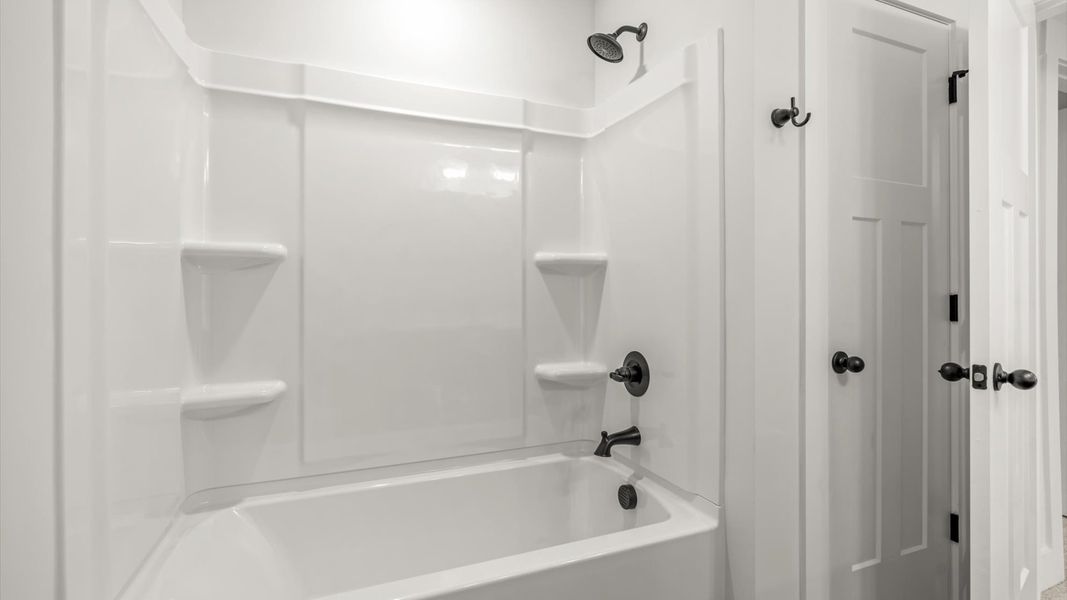 Stylish guest bathroom with superior design and thoughtful storage solutions