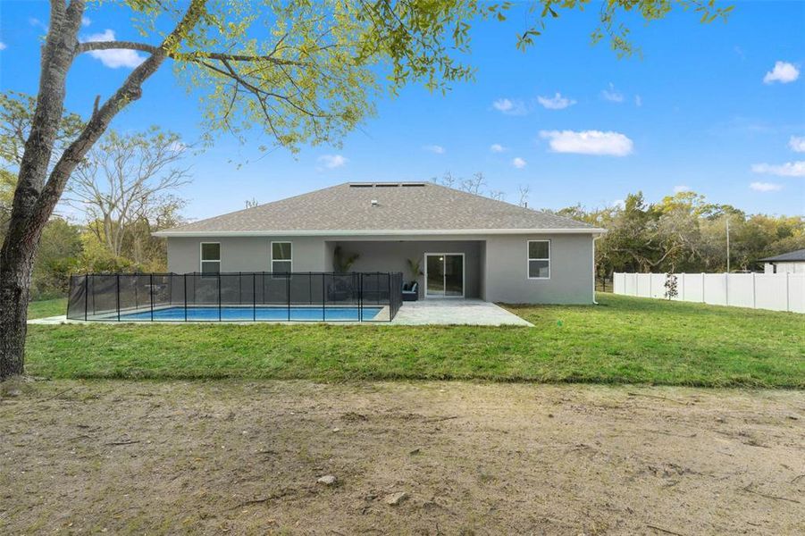 Exterior details and patio area of a home in , Spring Hill (Image 25).