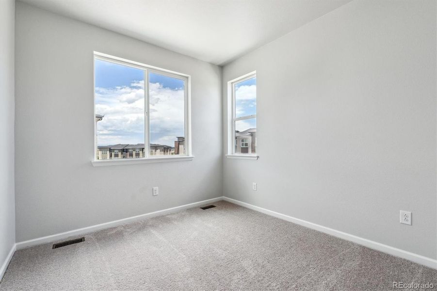 Spacious, unfurnished interior of a new home in Townhome Collection at Grand Vue at Interlocken, Broomfield (Image 14). Spacious, unfurnished interior of a new home in Townhome Collection at Grand Vue at Interlocken, Broomfield (Image 14).