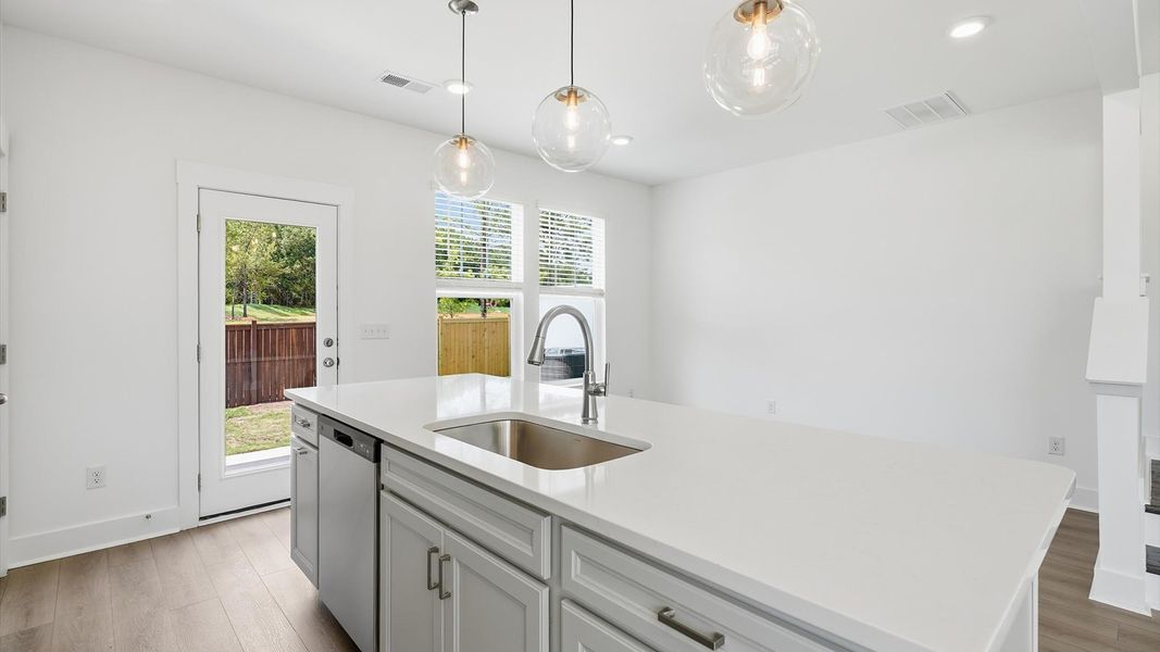 Well-designed kitchen with a center island and tasteful finishes that elevate everyday living at Barton Hollow