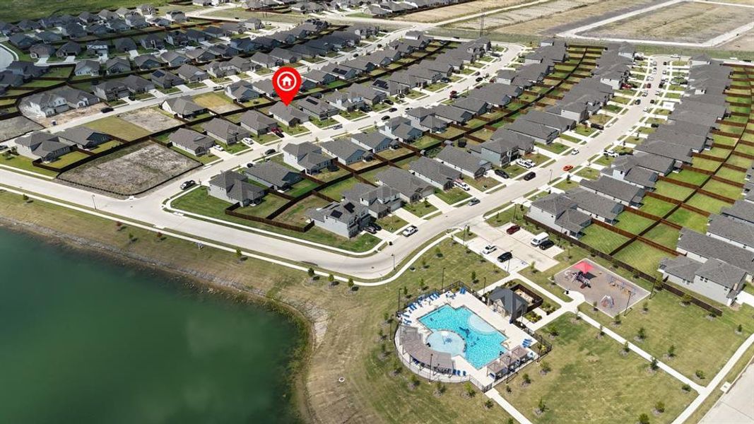 Aerial overview of property's location with nearby suburban area