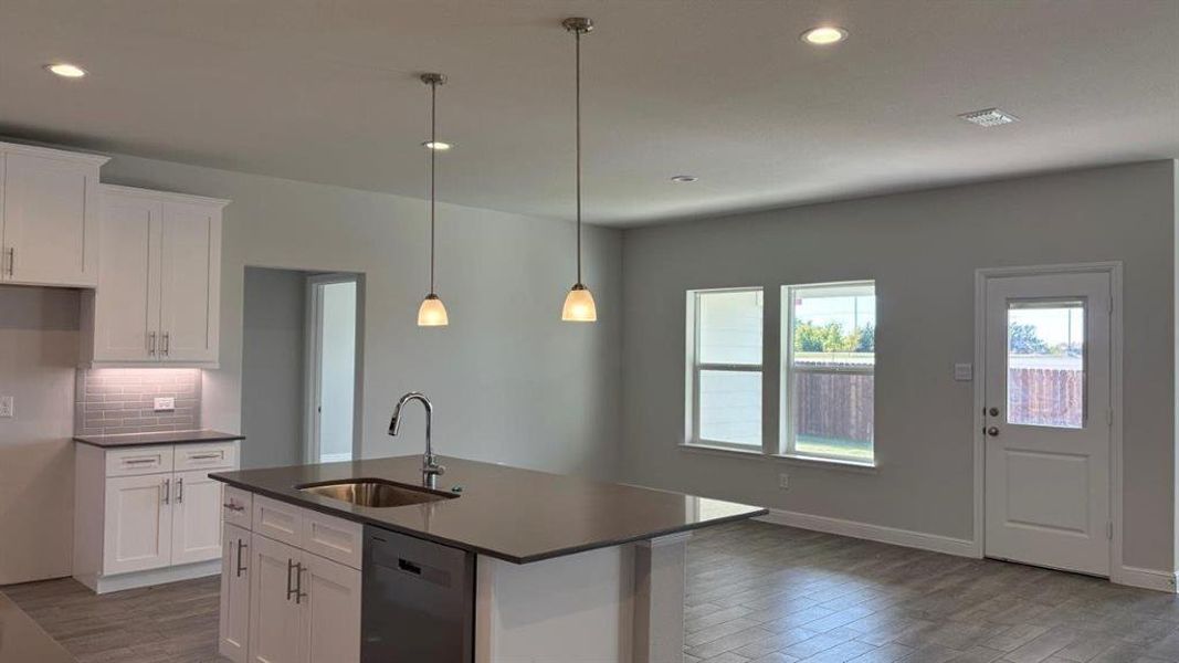 Kitchen - All Home and community information, including pricing, included features, terms, availability and amenities, are subject to change at any time without notice or obligation. All Drawings, pictures, photographs, video, square footages, floor plans, elevations, features, colors and sizes are approximate for illustration purposes only and will vary from the homes as built. Kitchen - All Home and community information, including pricing, included features, terms, availability and amenities, are subject to change at any time without notice or obligation. All Drawings, pictures, photographs, video, square footages, floor plans, elevations, features, colors and sizes are approximate for illustration purposes only and will vary from the homes as built.