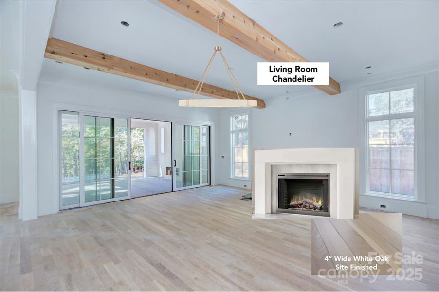 Living room with depiction of fireplace surround, light, and depiction of finished floors Living room with depiction of fireplace surround, light, and depiction of finished floors