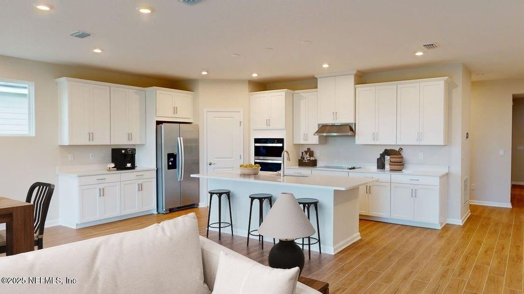 Furnished interior view inside a new home in Lakes at Bella Lago, Green Cove Springs (Image 8).