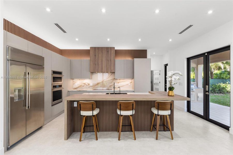 Furnished interior view inside a new home in , Coral Gables (Image 13).