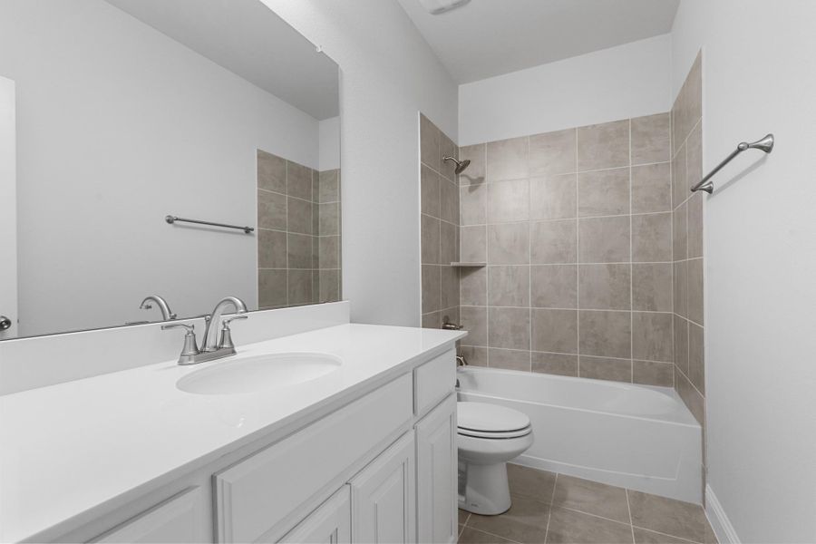 Representative furnished interior of a home built from the Garrison I by Cheldan Homes in Stoneview, Glen Rose (Image 5).