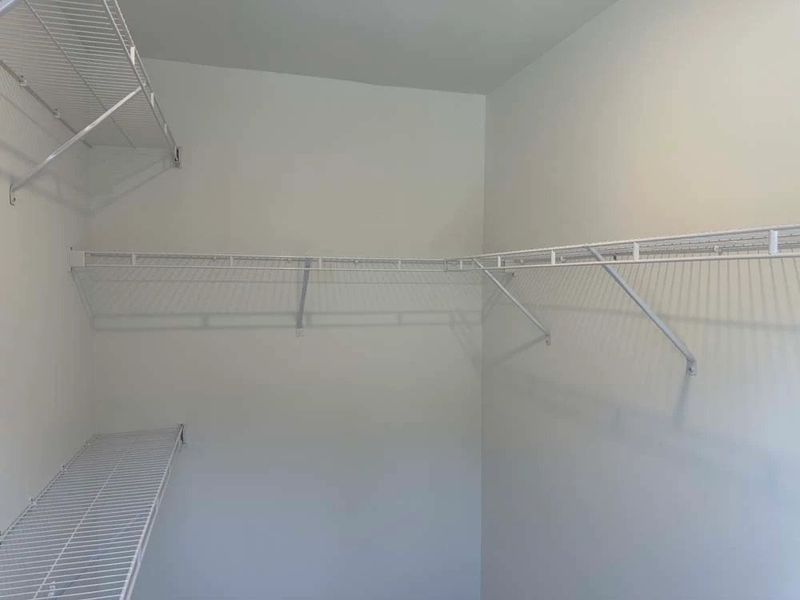 Primary Bedroom Walk-In Closet
