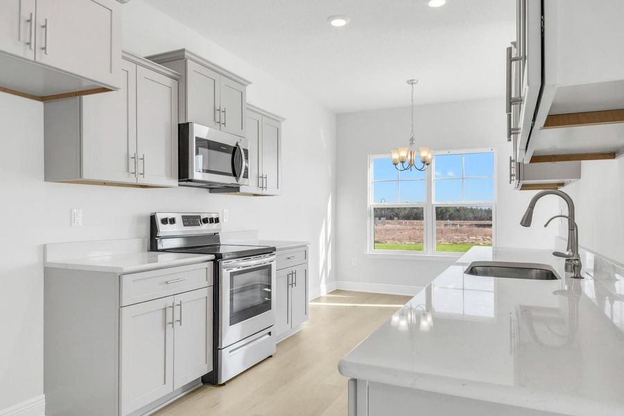Furnished interior view inside a new home in The Bluffs at Lafayette, Freeport (Image 6).