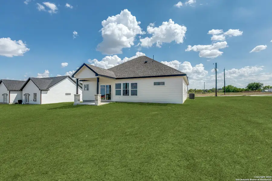 Exterior details and patio area of a home in , Atascosa (Image 3).
