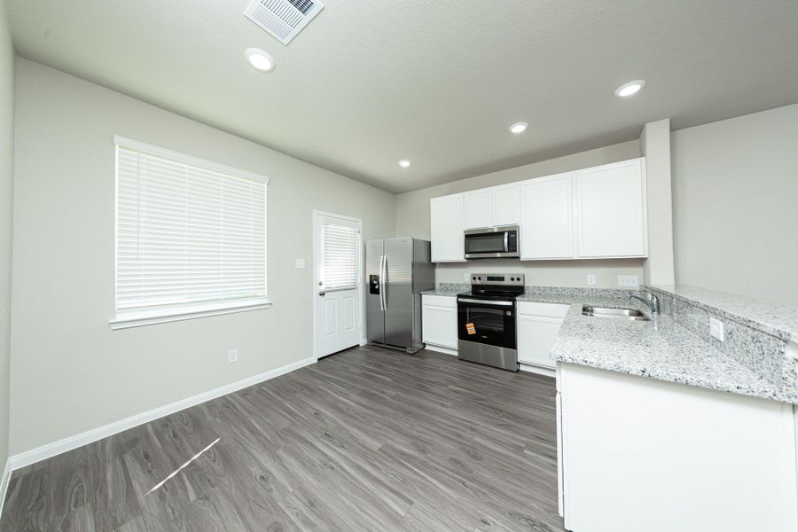 Furnished interior view inside a new home in Wayside Village, Houston (Image 5).