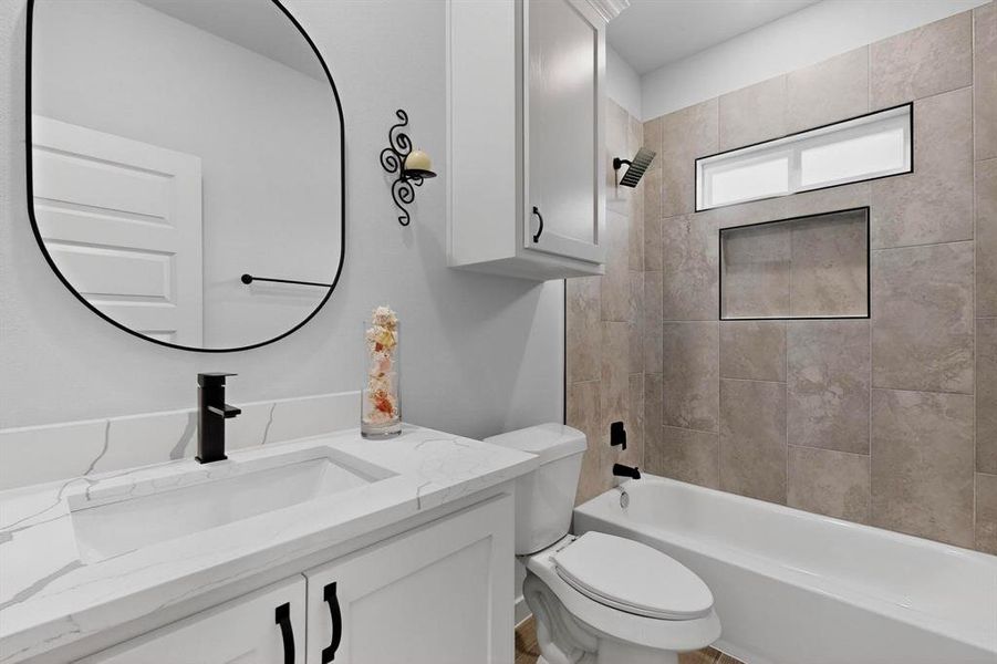 Full bath with shower / bathtub combination and vanity Full bath with shower / bathtub combination and vanity