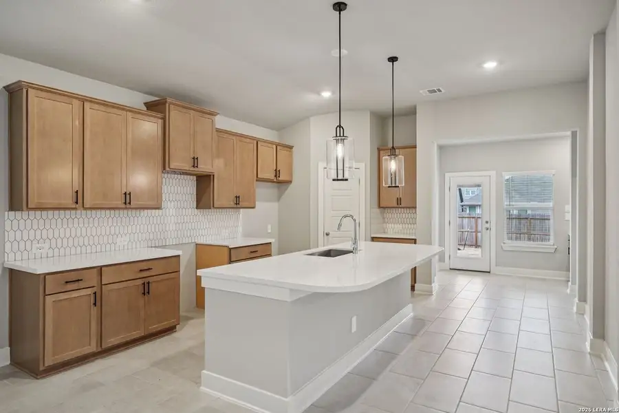 Furnished interior view inside a new home in Estancia Ranch - Premier Series, San Antonio (Image 16).