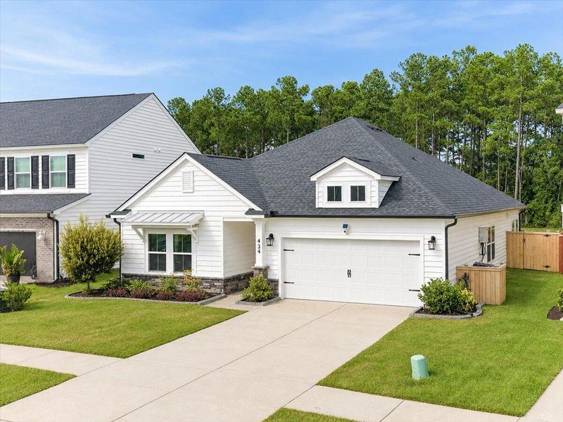 Front exterior of a new home in , Moncks Corner, SC, highlighting curb appeal (Image 22). Front exterior of a new home in , Moncks Corner, SC, highlighting curb appeal (Image 22).