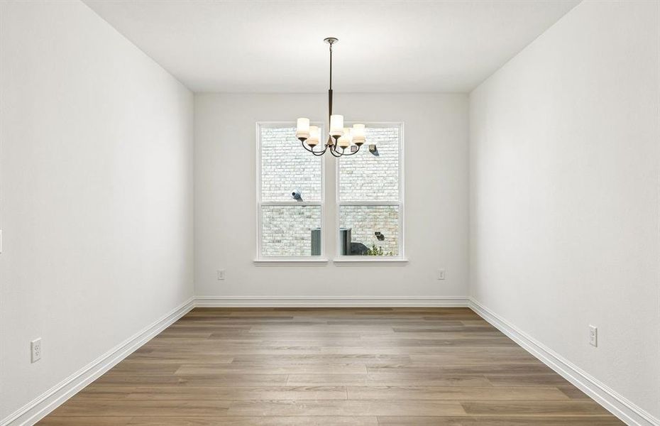 Formal dining room off entry