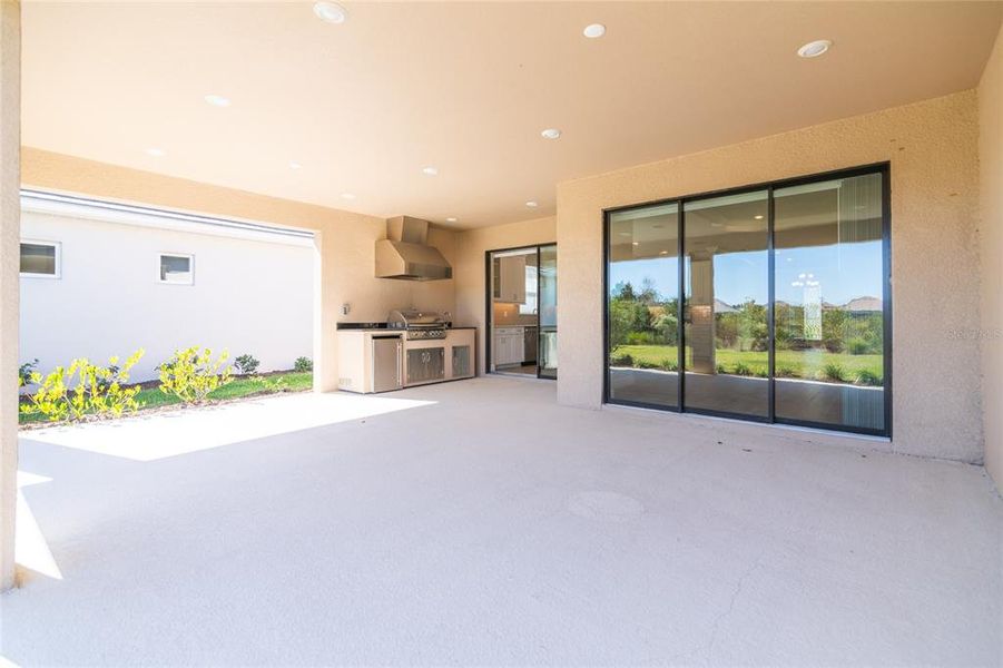 Exterior details and patio area of a home in Esplanade at Wiregrass Ranch, Wesley Chapel (Image 31).