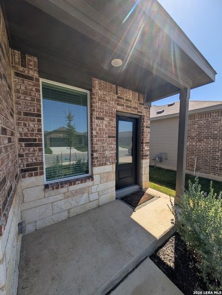 Exterior details and patio area of a home in Rose Valley, Converse (Image 21).
