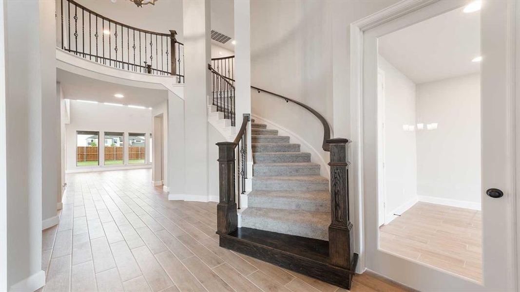 Furnished interior view inside a new home in Terraces 72', Rockwall (Image 7).