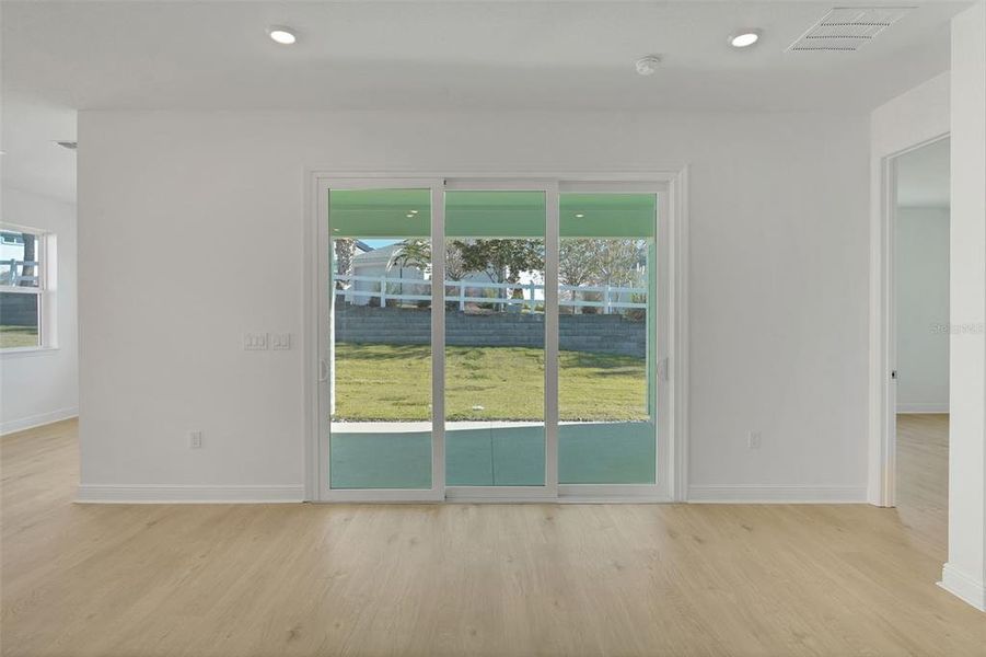 Spacious, unfurnished interior of a new home in Green Key Village, Lady Lake (Image 25).