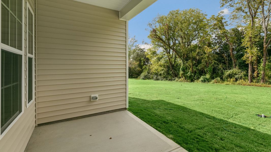 Exterior details and patio area of a home in The Villas at Martin Farms, Aberdeen (Image 3).