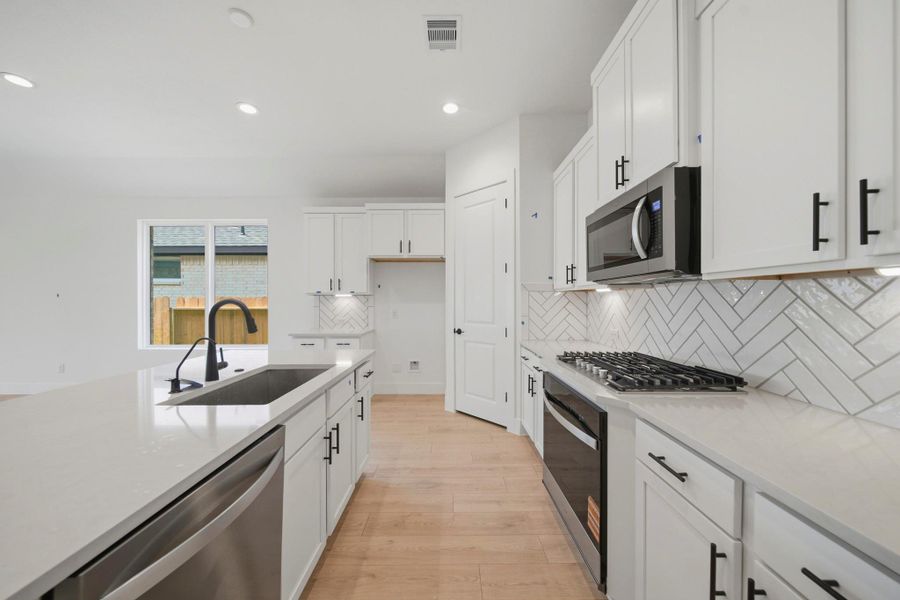 Furnished interior view inside a new home in Mill Creek Estates, Magnolia (Image 7).
