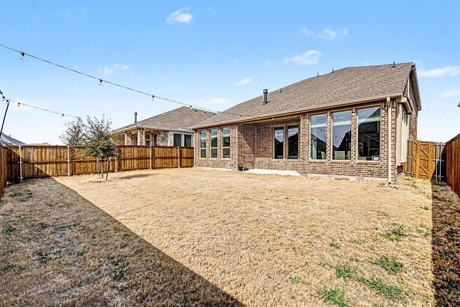 Exterior details and patio area of a home in Wildflower Ranch, Fort Worth (Image 4).