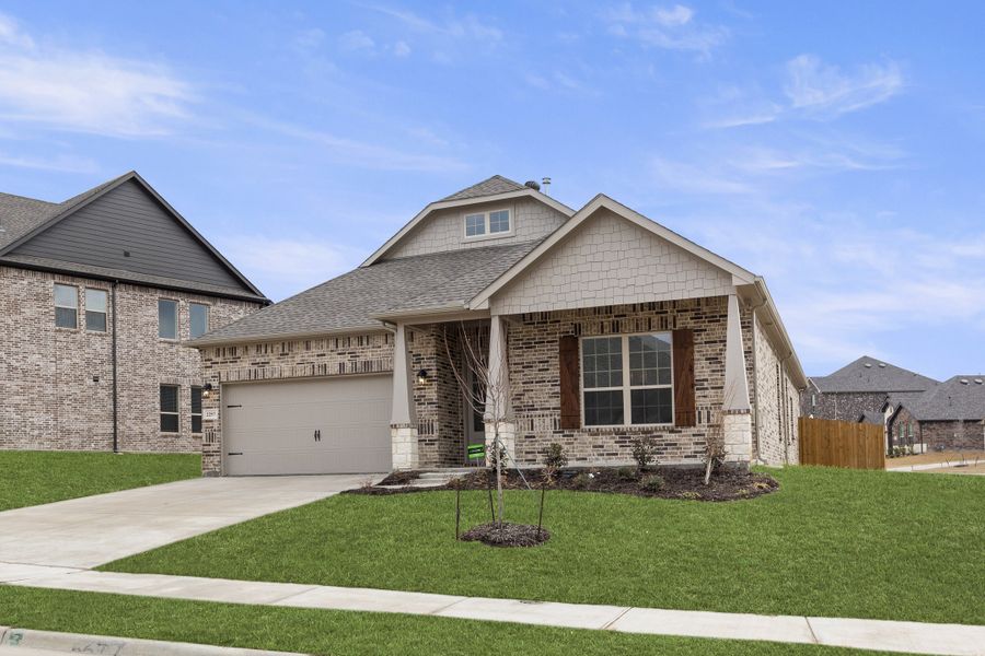 Representative exterior photo of a completed home built from the Brookstone II by Sandlin Homes in Timberbrook, Justin, TX (Image 22).