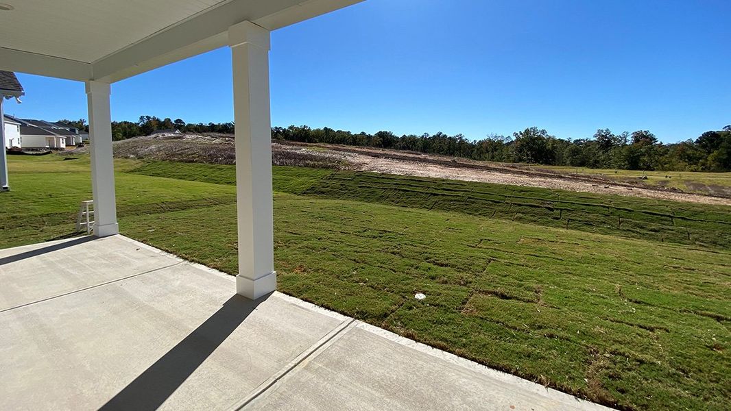 Exterior details and patio area of a home in Livingston Woods, Irmo (Image 2).