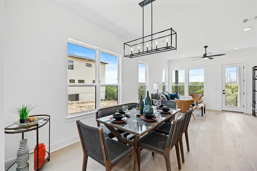 Open floor plan brings the outdoors in and ties family living room in