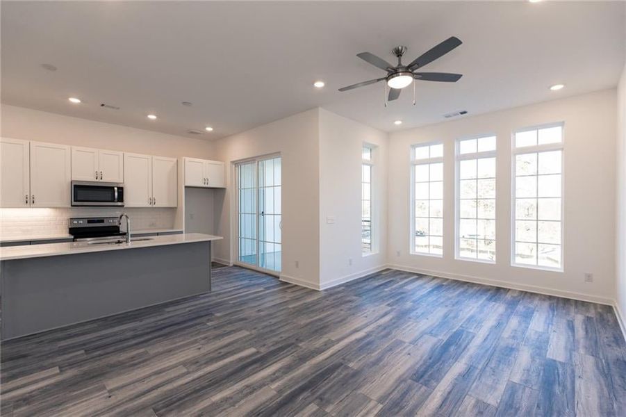 Hardwoods throughout main level Open Floor Plan providing endless options for furniture placement *Home is Under Construction. Photos shown are from other TPG Communities to display how the home will live*