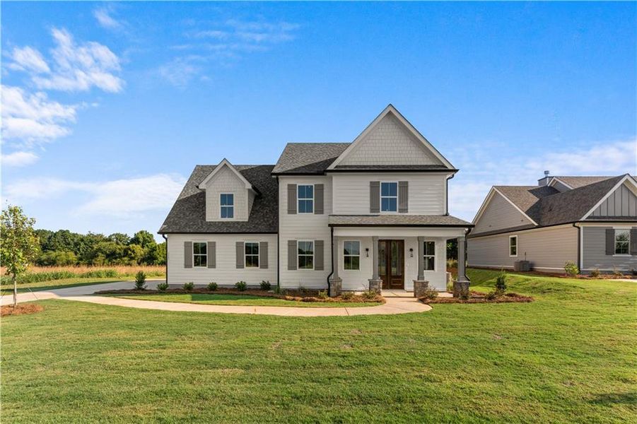 Front exterior of a new home in , Madison, GA, highlighting curb appeal (Image 2). Front exterior of a new home in , Madison, GA, highlighting curb appeal (Image 2).