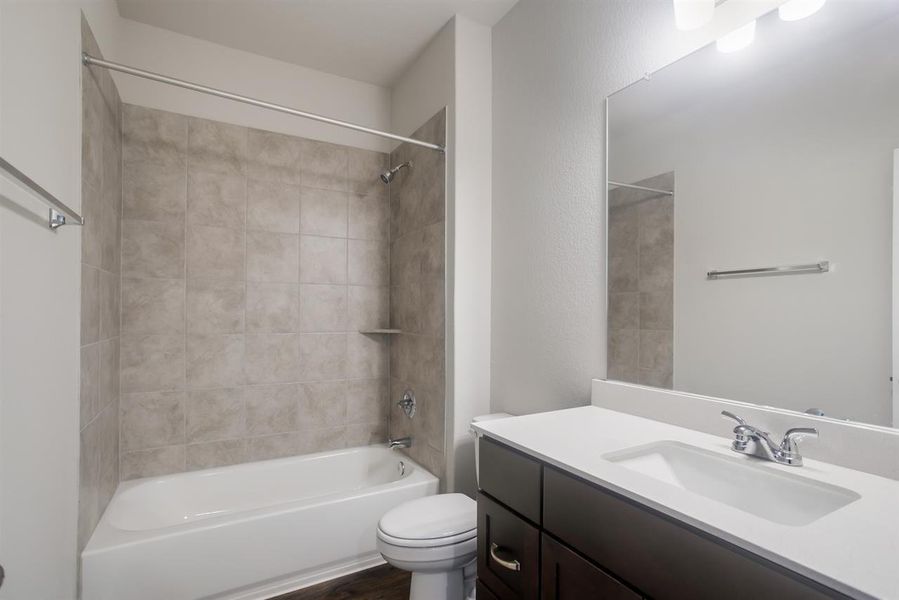Furnished interior view inside a new home in Oaks at San Gabriel, Georgetown (Image 9).