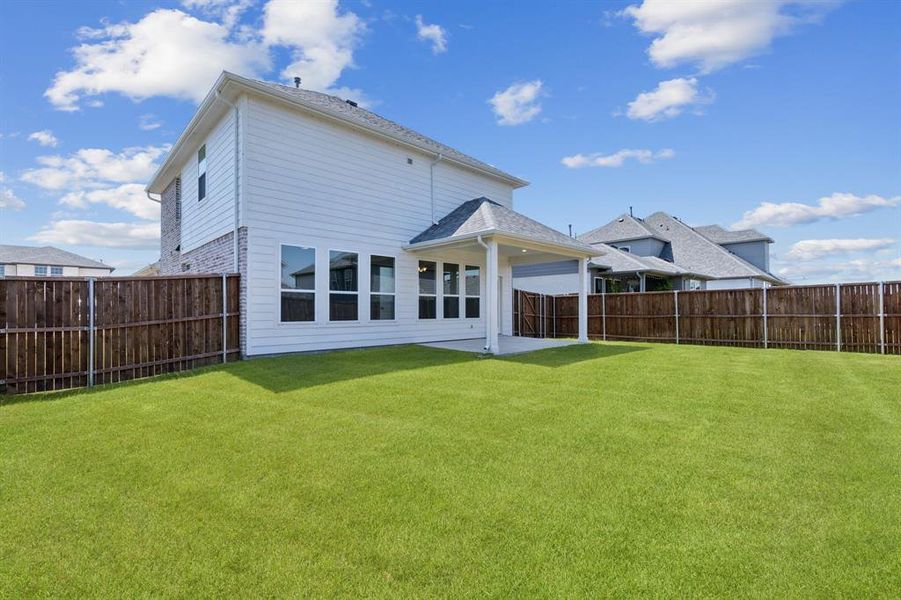 Exterior details and patio area of a home in Venetian, Weston (Image 4).