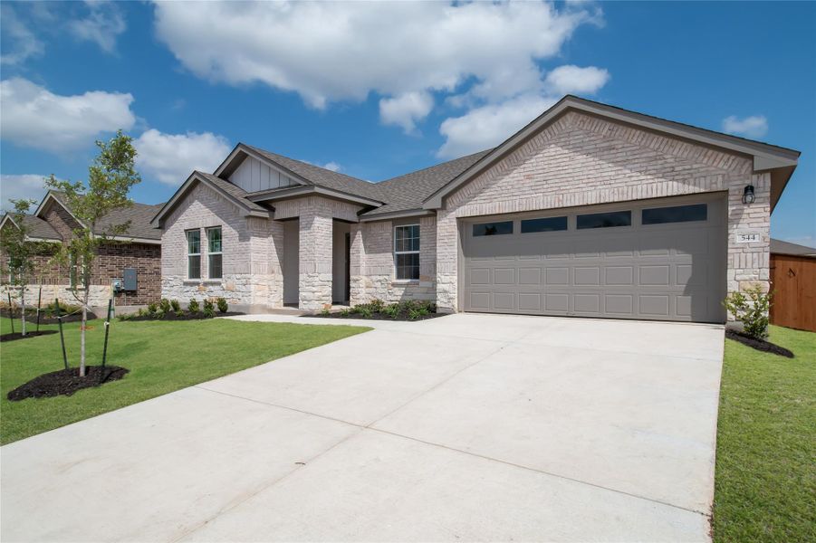 Front exterior of a new home in Riverview, Georgetown, TX, highlighting curb appeal (Image 13). Front exterior of a new home in Riverview, Georgetown, TX, highlighting curb appeal (Image 13).