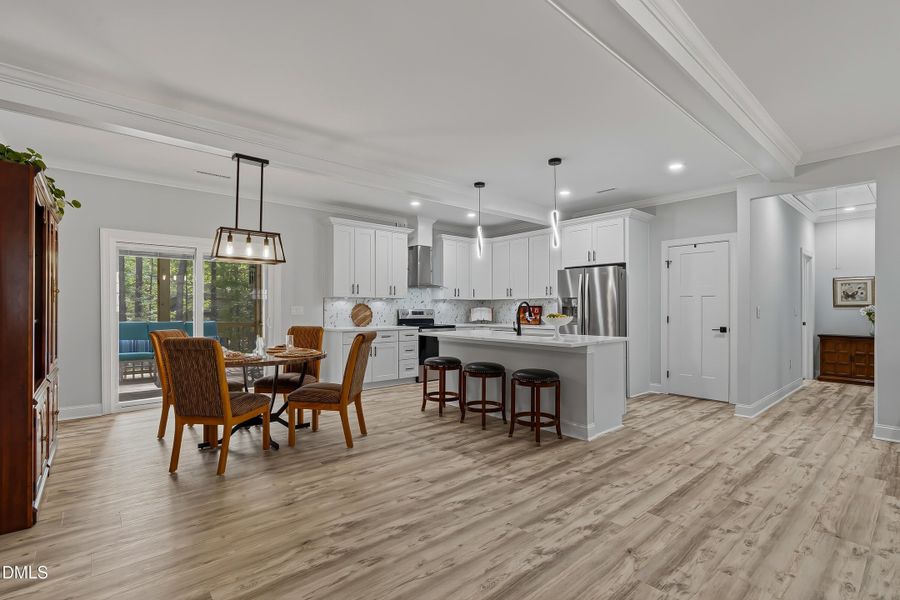 Kitchen opens to dining area