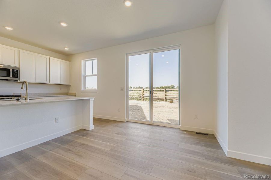 Spacious, unfurnished interior of a new home in Vermilion Creek: The Pioneer Collection, Centennial (Image 9).
