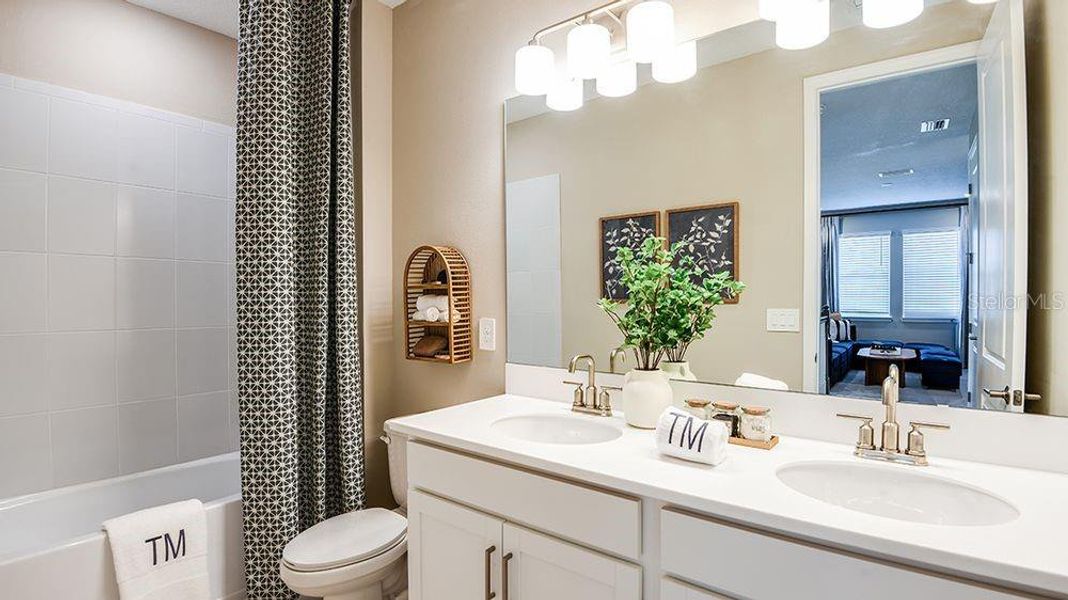 Furnished interior view inside a new home in Westview Community Group Page, Kissimmee (Image 8).