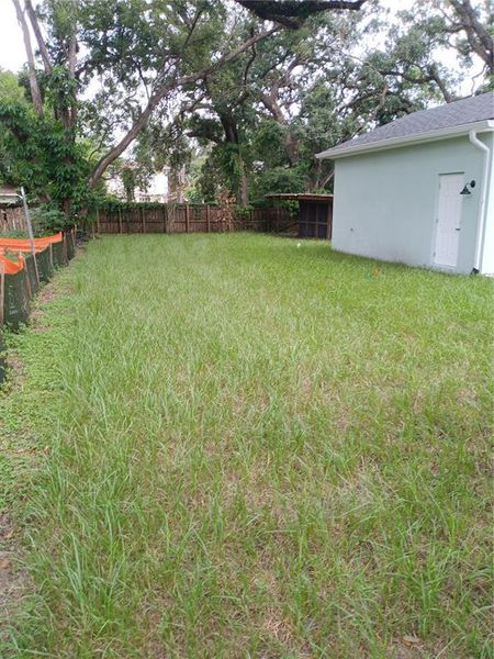 Front exterior of a new home in , Tampa, FL, highlighting curb appeal (Image 9).