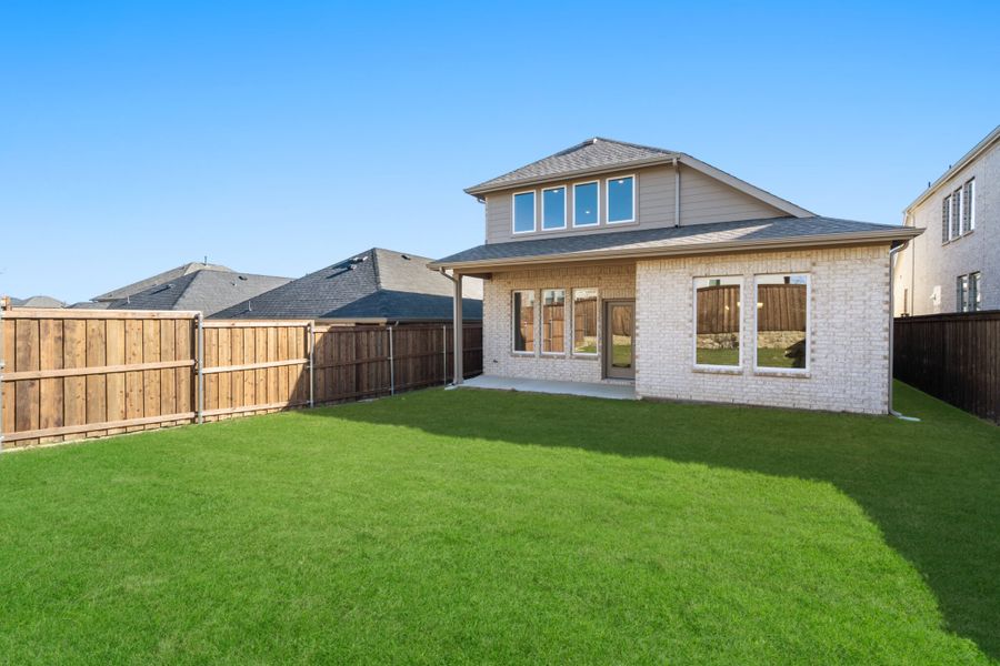 Exterior details and patio area of a home in Reunion, Rhome (Image 25).