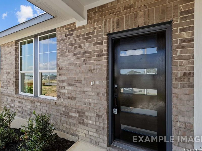 Exterior details and patio area of a home in Bricewood, San Antonio (Image 21).
