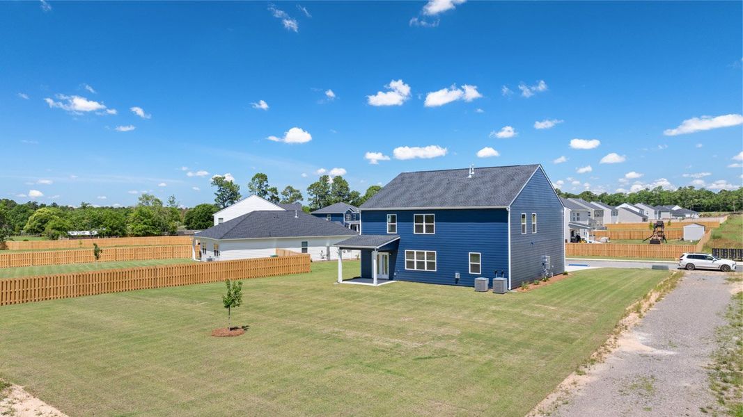 Front exterior of a new home in Southwind Village, Evans, GA, highlighting curb appeal (Image 21).