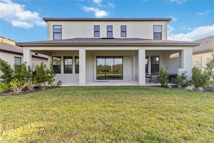 Exterior details and patio area of a home in , Nokomis (Image 4).